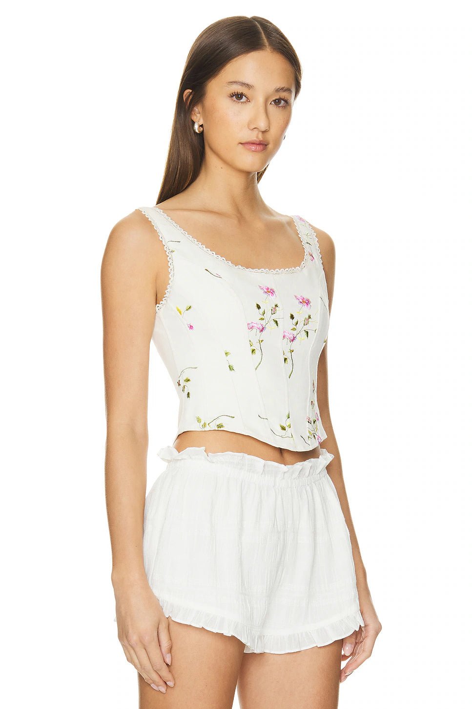 Side view of the LoveShackFancy Rhapsody Bustier showing the structured fit and floral stretch twill fabric.