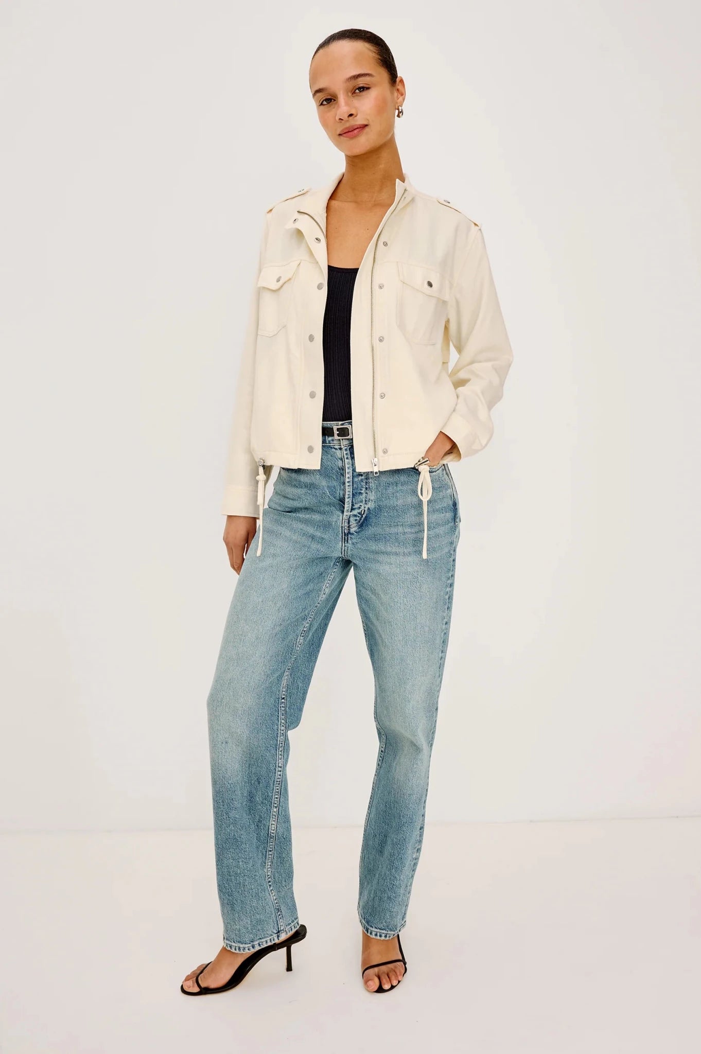 Full view of a model wearing the Rails Collins Jacket in Ivory styled with jeans and a tank.