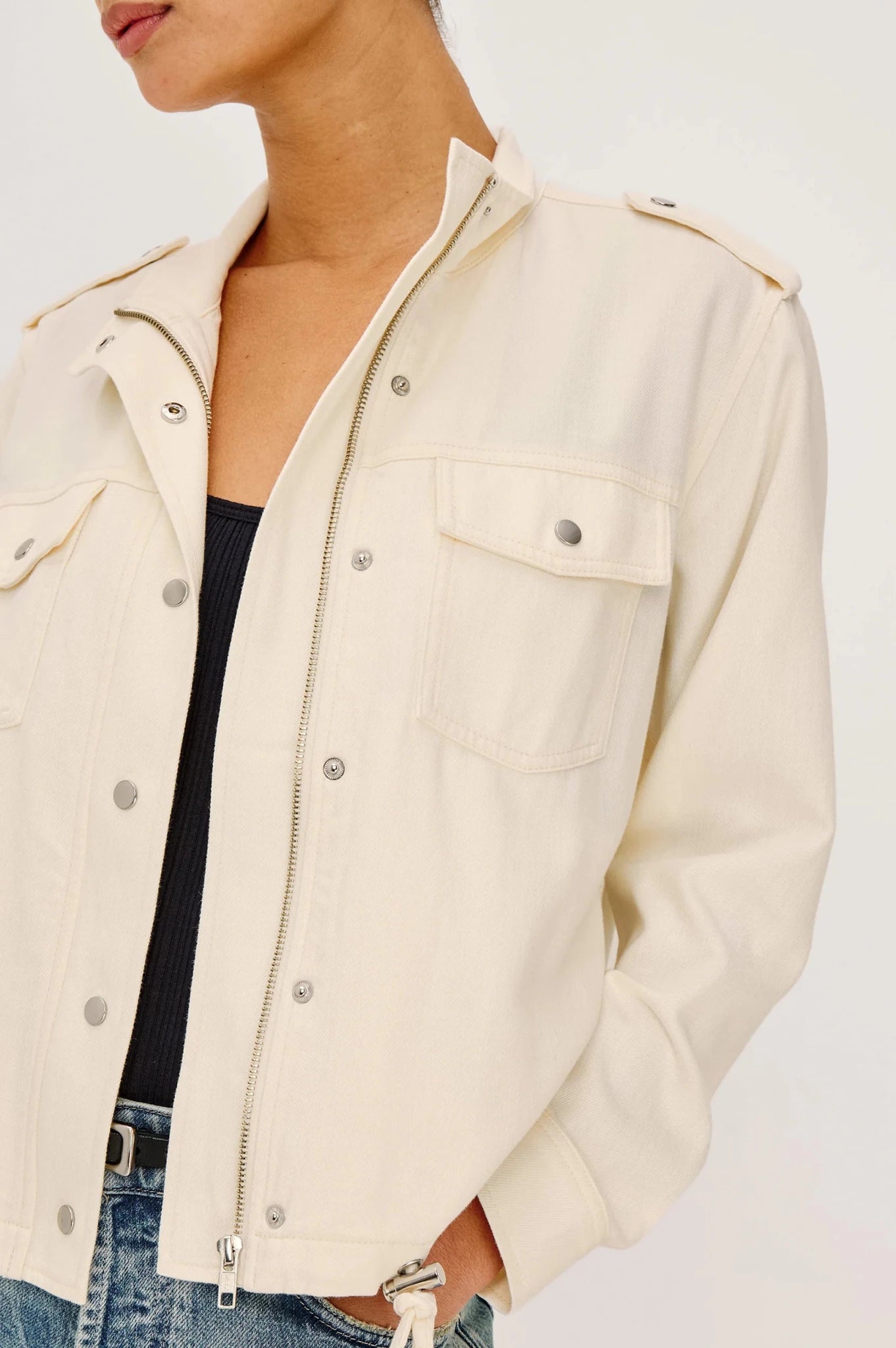 Close up of the Rails Collins Jacket in Ivory showcasing the zipper, snaps, and adjustable drawstrings.