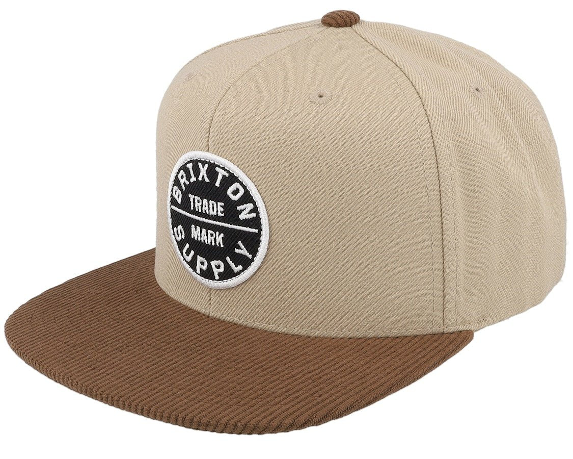 Brixton Oath III Snapback in Khaki and Sepia featuring a tan structured crown and a brown corduroy brim with a merrowed-edge embroidered patch