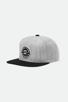 Brixton Oath III Snapback in Light Heather Grey and Black, featuring a structured grey crown and a flat black wool-blend brim with a merrowed-edge logo patch.