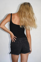 Rear photo of a woman wearing the LNA Scoop Rib Tank in Black available at Endless Waves Boutique