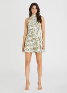 Model wearing Aqua Blu Australia Clementine Kaley Mini Dress floral mock halter mini dress.