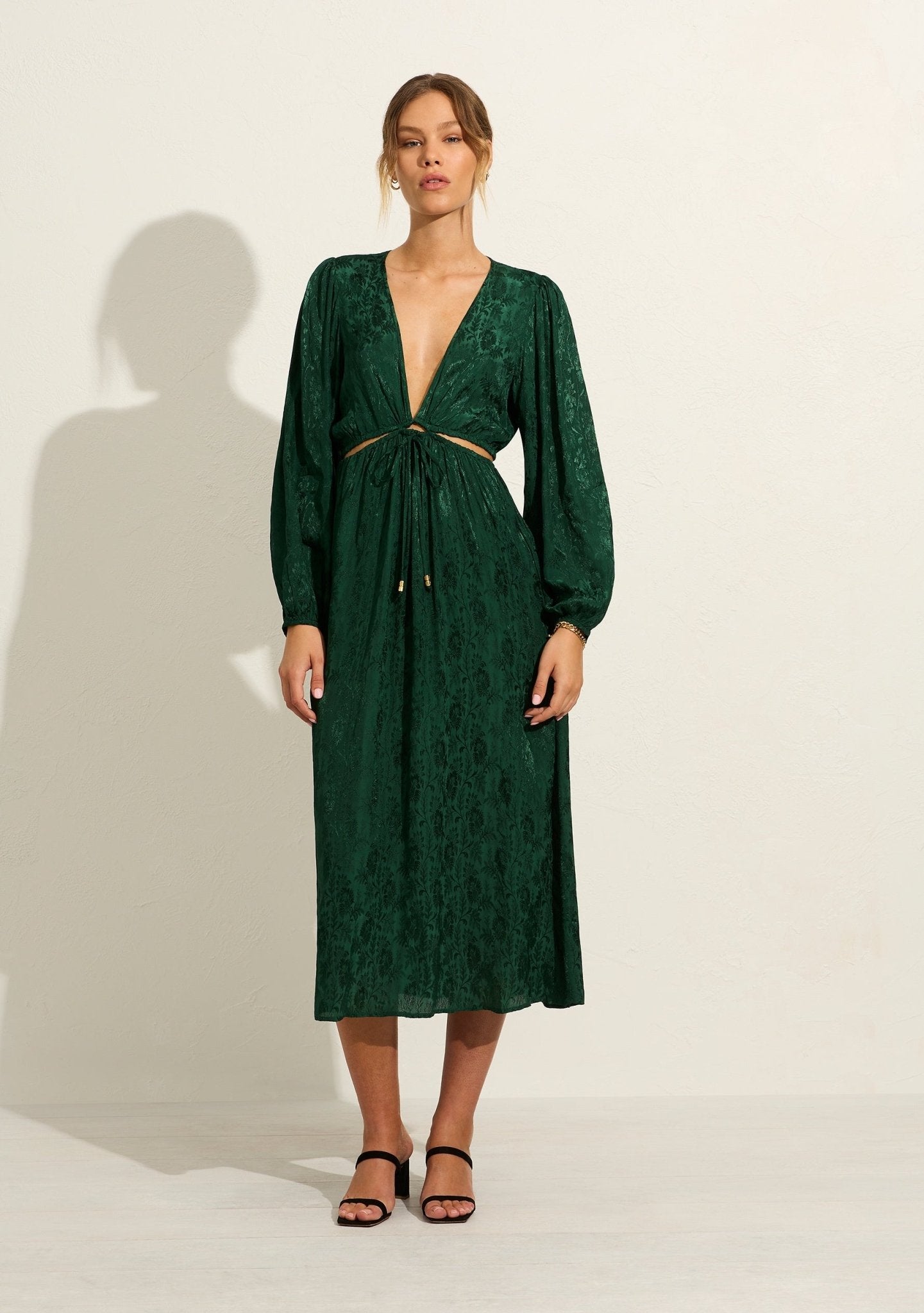 Front view of the Auguste The Label Kaia Midi Dress in Emerald Green, featuring a deep V-neckline, front-tie detail, and long sweeping sleeves - Endless Waves