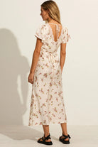 Rear view of the Auguste The Label Rianne Midi Dress showing the delicate tie-back detail and lace-trimmed open back.