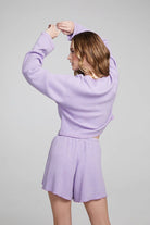 Rear view of the Briaa Thermal Long Sleeve and Jimi Shorts in waffle knit purple rayon blend.