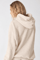 Rear view of Electric & Rose Taylor hoodie in oatmeal fleece
