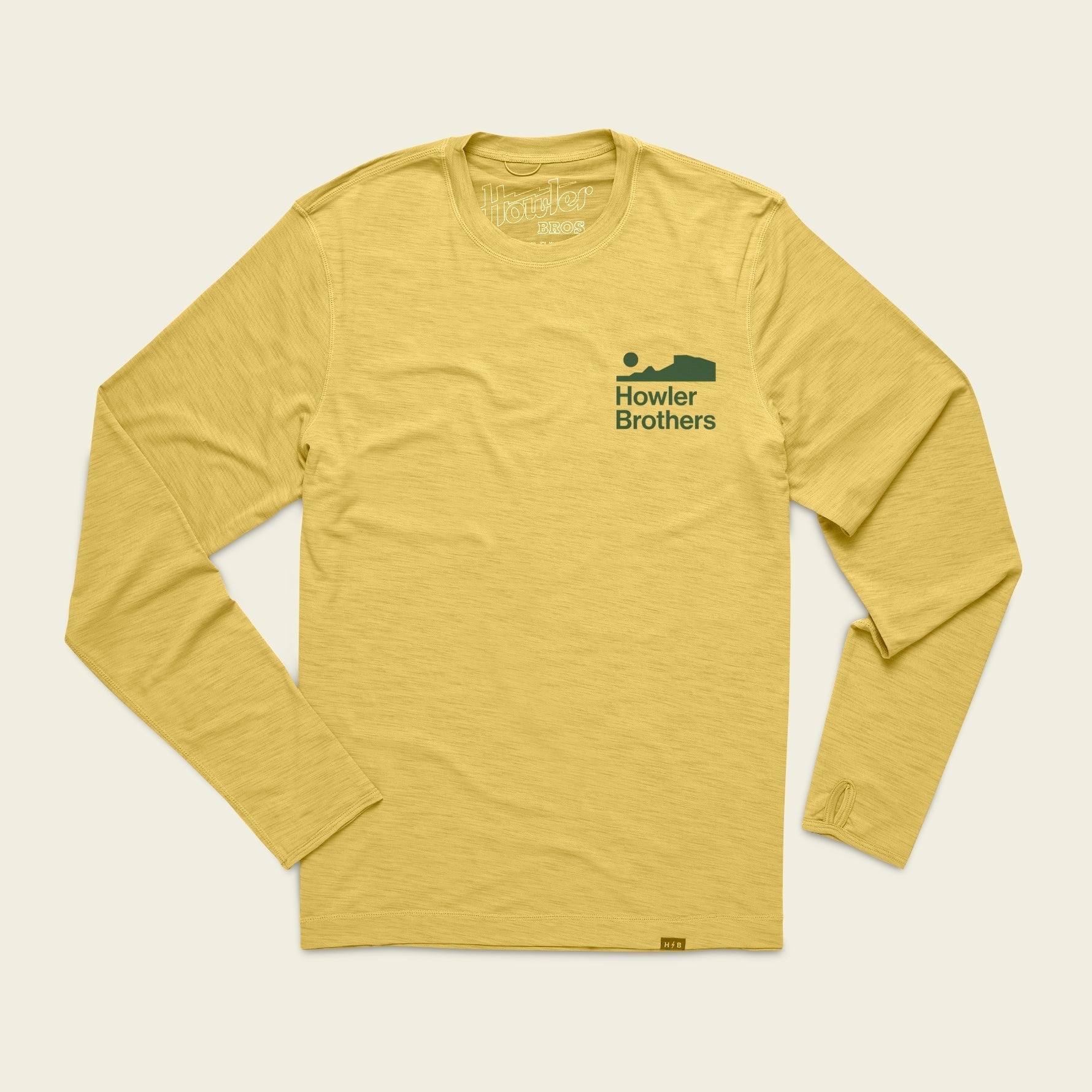 Howler Bros HB Tech Tee in Gold on a white background available at Endless Waves