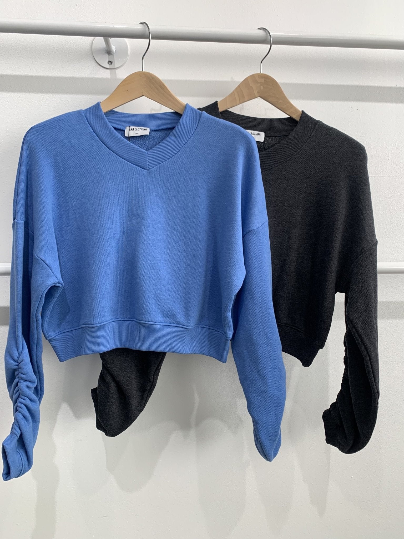 LNA Latigo V Neck Sweatshirt  hanging up in Smokey Blue