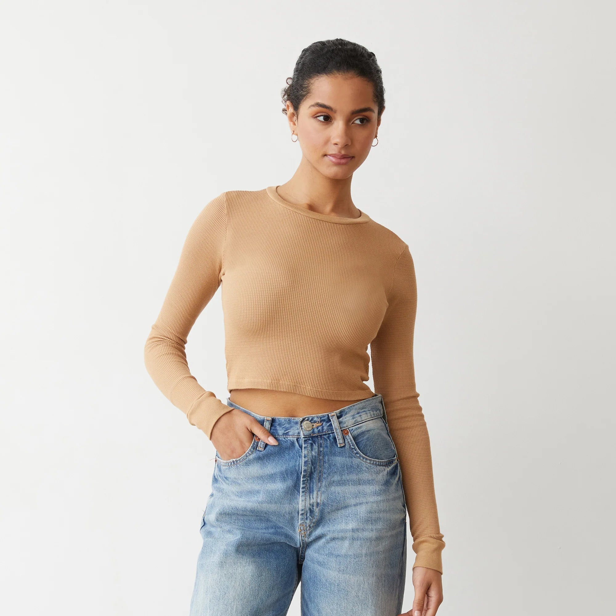 Monrow Baby Thermal Cropped Long Sleeve in Latte styled with jeans.