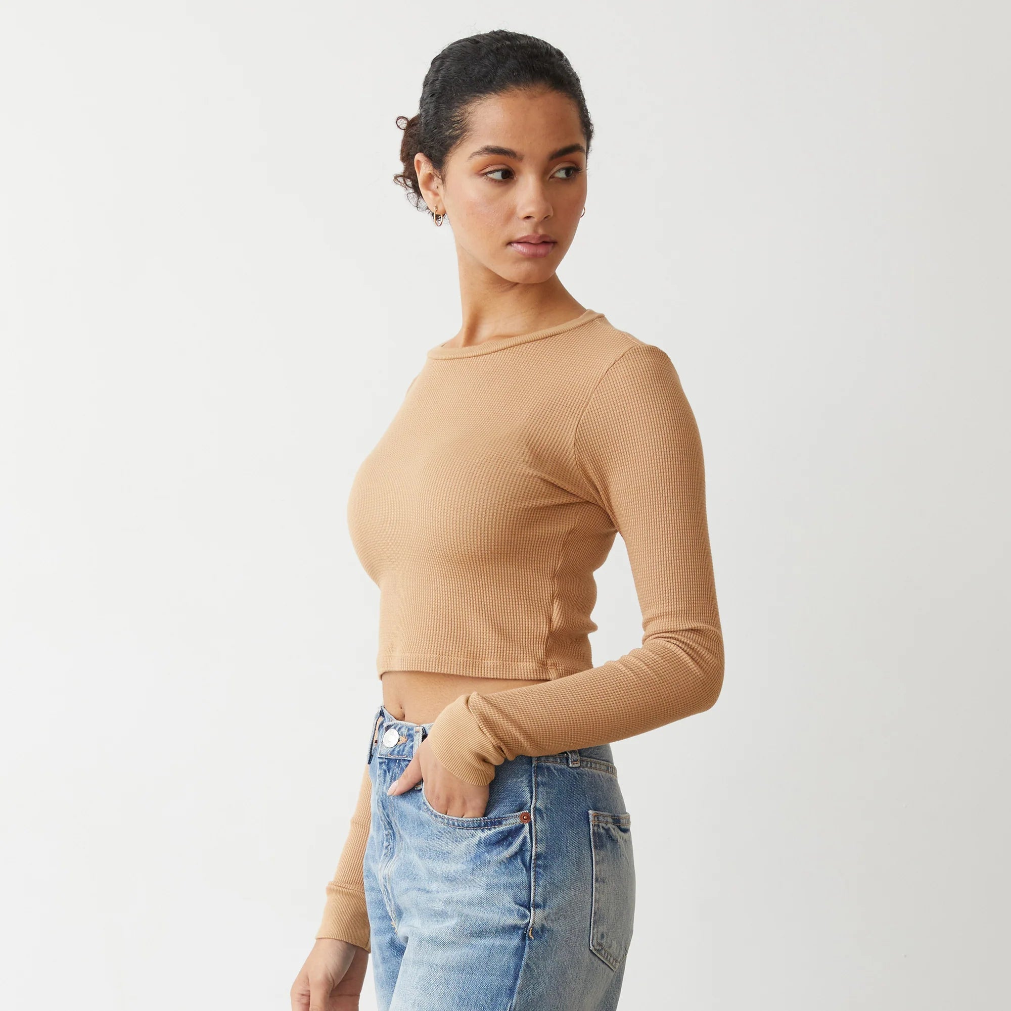 Woman wearing the Monrow Baby Thermal Cropped Long Sleeve in Latte