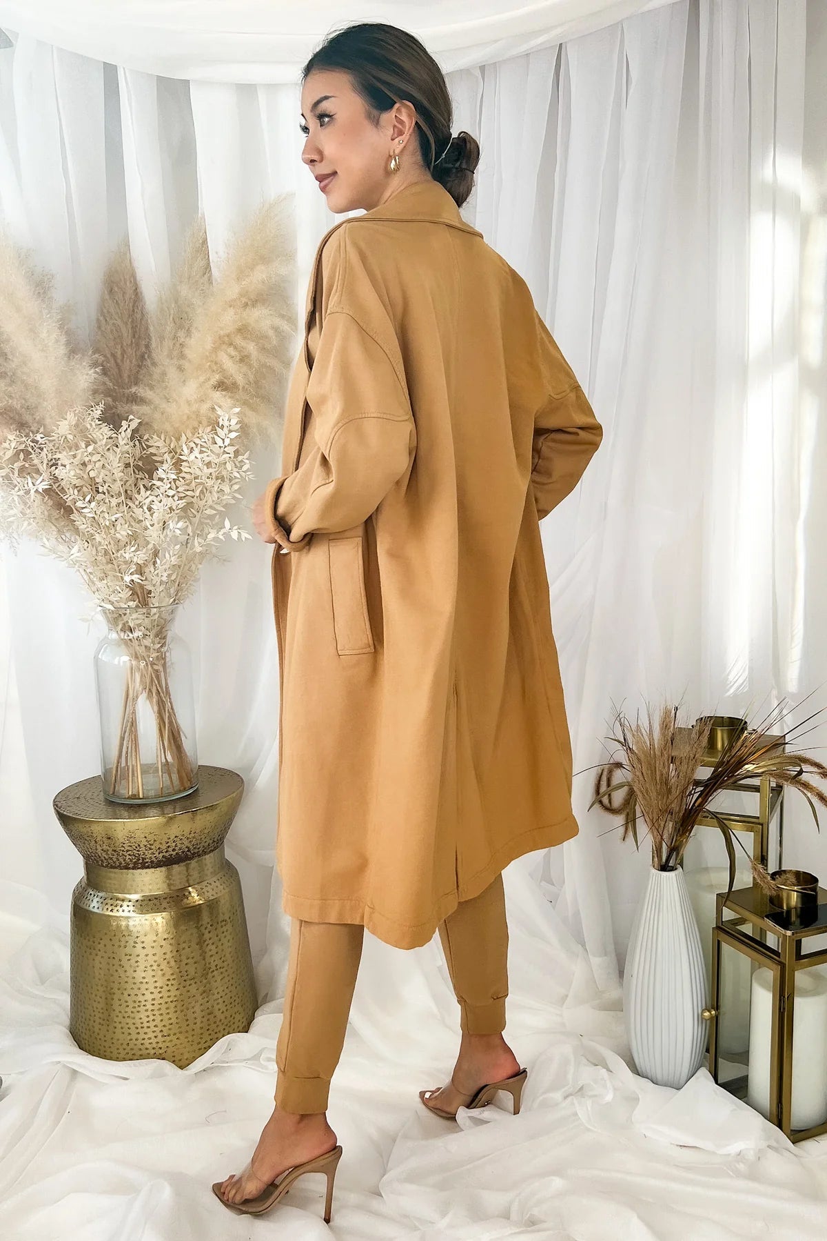 Back view of the MONROW Seamed Fleece Coat in Latte showing double-breasted detail and midi length - Endless Waves