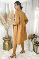 Back view of the MONROW Seamed Fleece Coat in Latte showing double-breasted detail and midi length - Endless Waves