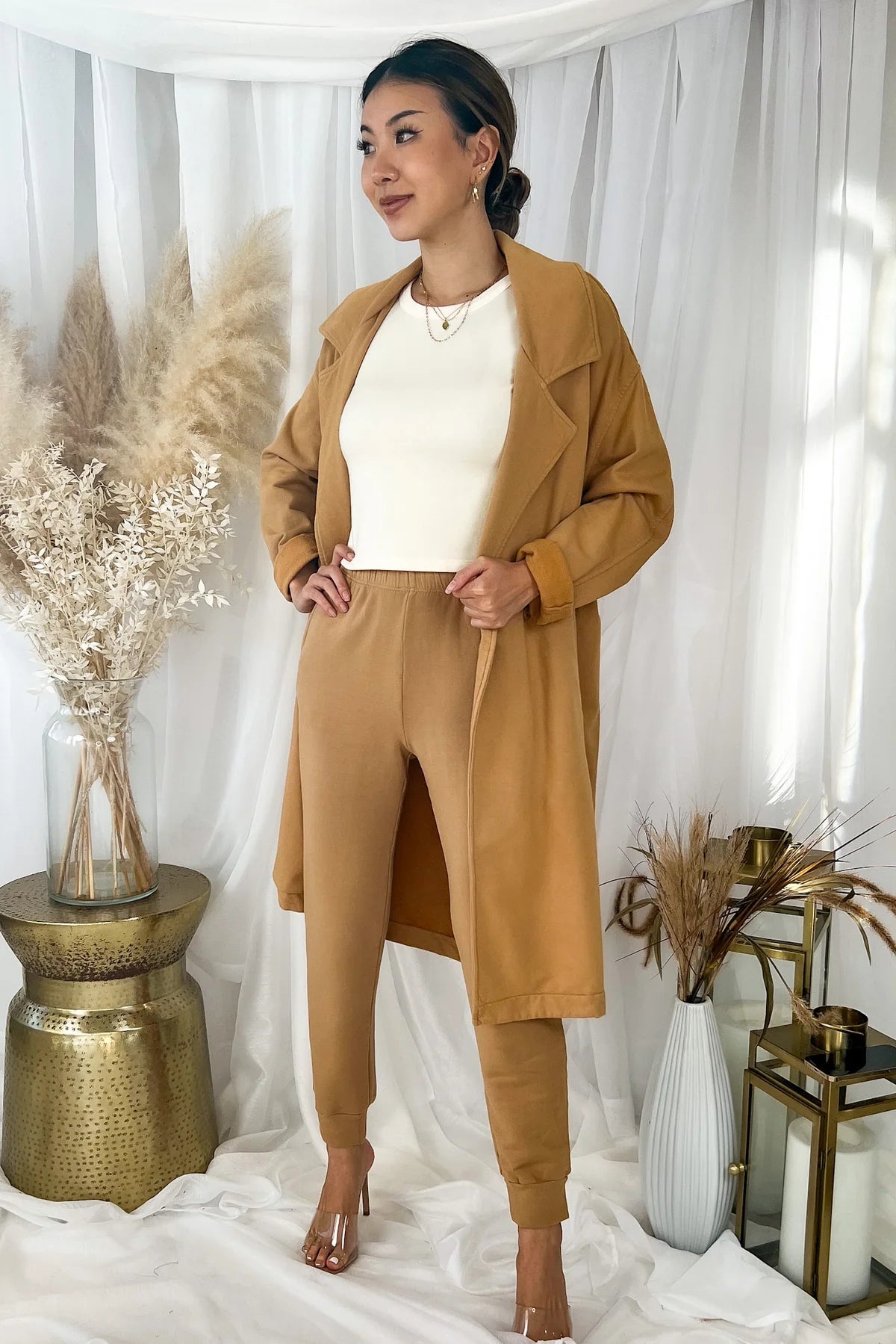 Front view of the MONROW Seamed Fleece Coat in Latte showing the relaxed lapels and double-breasted silhouette.