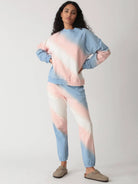 Electric & Rose Ronan Tie Dye Sweatshirt and Vendimia Jogger set in Whisper Lapis Peach fleece.